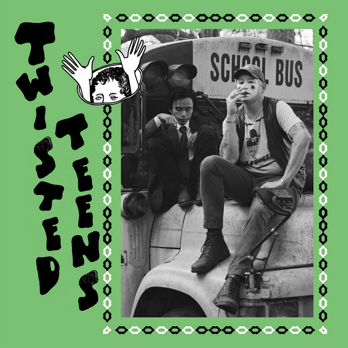 Green Twisted Teens cover: two men sit on the front of an old school bus, one in a suit and one wearing clown face paint and smoking